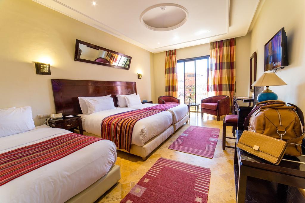 Hotel Les Trois Palmiers Marrakesch Zimmer foto